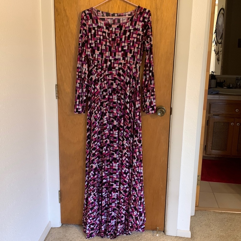 Very long multicolored, long sleeve maxi dress. Llots of material in the skirt